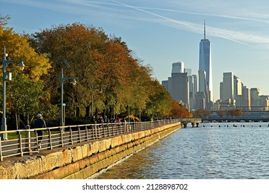 NEW YORK CITY, USA - NOV 19, 2021: Manhattan Waterfront Greenway On Sunset. New York City