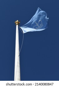 NEW YORK CITY, USA - NOV 16, 2021: Columbia University Flag Against Blue Sky. New York City