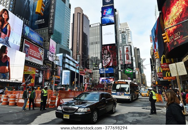 NEW YORK\
CITY, USA - NOV 11, 2015: Traffic and people make their through\
Times Square in downtown\
Manhattan.