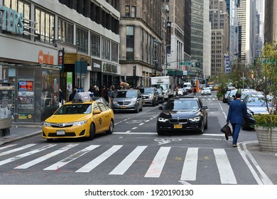 New York City, USA - November 12, 2018: Traffic Pass Along A Busy Midtown Manhattan Street.