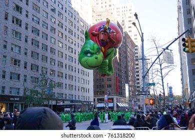 NEW YORK CITY, USA- NOVEMBER 23 2017: The 91st Annual Macy's Thanksgiving Day Parade Attracted Hundreds Of Thousands Of Spectators. The Grinch Who Stole Christmas Balloon