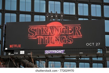 New York City, USA - November 7, 2017: View Of A Neon Stranger Things 2 Billboard Sign Seen Above A Manhattan Street. 