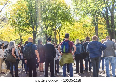 New York City, USA - October 28, 2017: Manhattan NYC Central Park, Crowd Of People Standing Watching Street Performance On Sunny Day, Walking