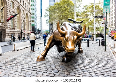 New York City, USA - October 30, 2017: Wall Street stock exchange charging metal bull in NYC Manhattan lower financial district downtown NYSE, closeup of face