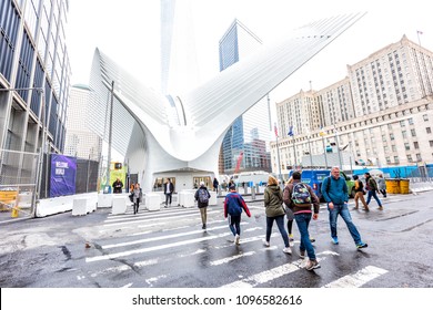 New York City, USA - October 30, 2017: People Entering Doors At The Oculus Transportation Hub At World Trade Center NYC Subway Station, Modern Futuristic White Construction, Exterior Building Entrance