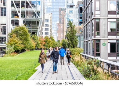 New York City, USA - October 30, 2017: Highline, High Line Boardwalk, Walk, Urban Garden In New York City NYC With Many People Tourists Walking In Chelsea West Side By Hudson Yards, Green Lawn