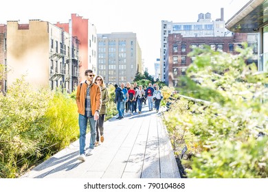 New York City, USA - October 27, 2017: Highline, High Line Boardwalk, Walk, Urban Garden In New York City NYC With Many People Tourists Walking In Chelsea West Side By Hudson Yards