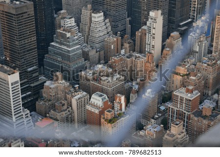 Similar – Skyline of Manhattan at night with skyscrapers lights