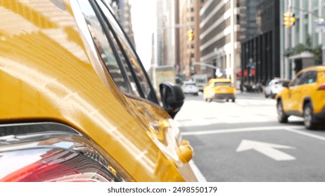 New York City. Yellow taxi car on Manhattan street. Taxi cab on Midtown Lexington avenue. Medallion taxicab rear view on Lex ave waiting for people or passengers on road. Urban scene in United States. - Powered by Shutterstock