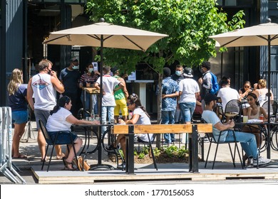 New York City, New York/USA July 5, 2020 Restaurants Setup Outside Dining Area And Continue To Practice Social Distancing After Being Shutdown During The Coronavirus Pandemic. 