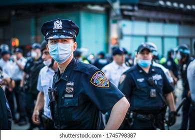 New York City, New York/USA May 30, 2020 Hundreds took to the streets of Manhattan protesting against police brutality after the death of George Floyd at the hands of Minneapolis police.  