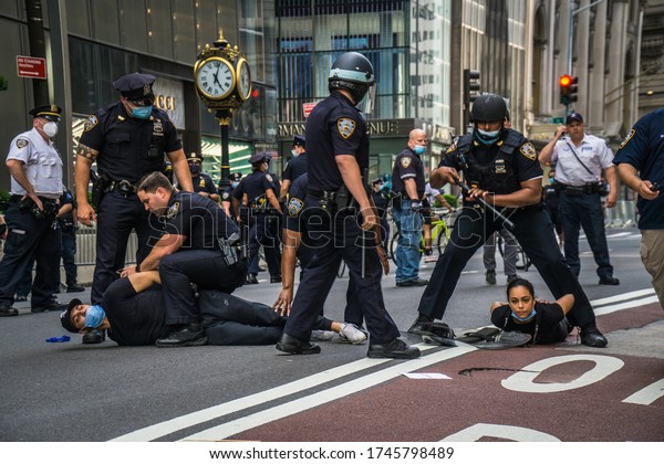 New\
York City, New York/USA May 30, 2020 Hundreds took to the streets\
of Manhattan protesting against police brutality after the death of\
George Floyd at the hands of Minneapolis police. \

