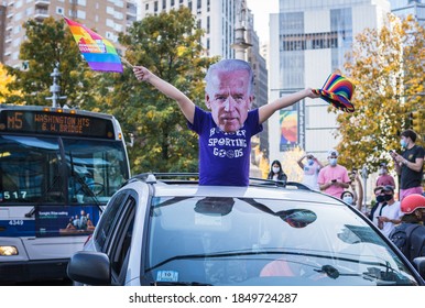 New York City, New York/USA November 7, 2020. Thousands Celebrate Joe Biden Defeating Donald Trump In The Presidential Election  And Kamala Harris The First Woman Vice President Of The United States. 