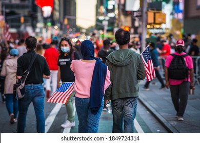 New York City, New York/USA November 7, 2020. Thousands Celebrate Joe Biden Defeating Donald Trump In The Presidential Election  And Kamala Harris The First Woman Vice President Of The United States. 