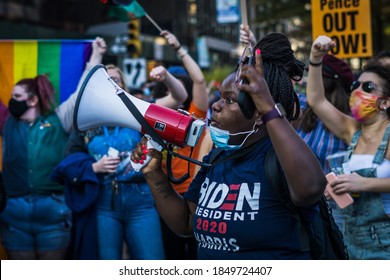 New York City, New York/USA November 7, 2020. Thousands Celebrate Joe Biden Defeating Donald Trump In The Presidential Election  And Kamala Harris The First Woman Vice President Of The United States. 