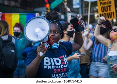 New York City, New York/USA November 7, 2020. Thousands Celebrate Joe Biden Defeating Donald Trump In The Presidential Election  And Kamala Harris The First Woman Vice President Of The United States. 