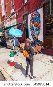 NEW YORK CITY-OCTOBER 09, 2015: Audrey Hepburn Mural With Unidentified People. Its Part Of The L.I.S.A Project That Brings Artists Together In Little Italy Creating Manhattans Only Mural Arts District