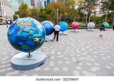 NEW YORK CITY-OCTOBER 13,2015: Cool Globes Is A Public Art Exhibition To Raise Awareness Of Solutions To Climate Change. It Grew Out A Commitment At Clinton Global Initiative 2005. Unidentified People