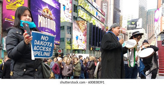 New York City/USA March 13 2017: No Dakota Access Pipeline: Demonstrators In Times Square Protest The Controversial Dakota Access Pipeline.