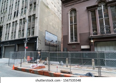 New York City/USA - September 2, 2019: NYC Construction Zone In Back Alley In Downtown Urban Environment With Inner City Wall Art.