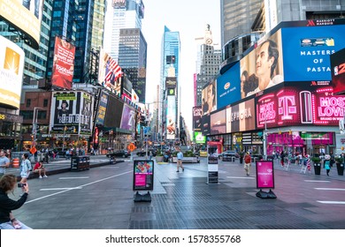 New York City/USA - September 2, 2019: Street Level View From Duffy Square In Times Square With Large Advertisements And Screen Marketing.