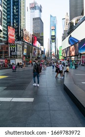 New York City/USA - September 2, 2019: Vertical View Of Times Square In Midtown Manhattan With Big City Scenery.