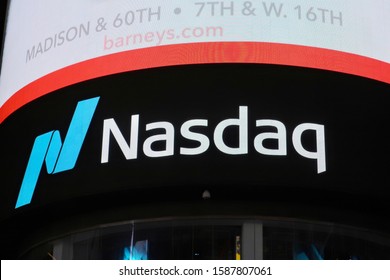 NEW YORK - DECEMBER 12, 2019: NASDAQ Brand Logo Sign At MarketSite Times Square Global Headquarters