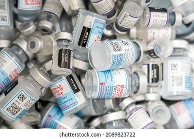 NEW YORK - DECEMBER 12, 2021: Empty Moderna And Pfizer COVID - 19 Vaccine Vials In A Local Pharmacy In New York