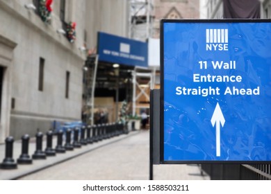 NEW YORK - DECEMBER 13, 2019: NYSE Direction Sign With Brand Logo At Stock Exchange Exterior