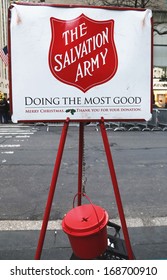 NEW YORK - DECEMBER 19  Salvation Army Red Kettle For Collections On December 19, 2013 In Midtown Manhattan  This Christian Organization Is Known For Its Charity Work, Operating In 126 Countries 