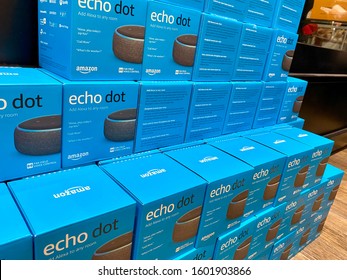 NEW YORK- DECEMBER 30, 2019: Shot is of Amazon Echo Dot. Smart speaker AMZN Jeff Bezos CEO. Has virtual assistant Alexa. Ask for music, news, information in your smart home.