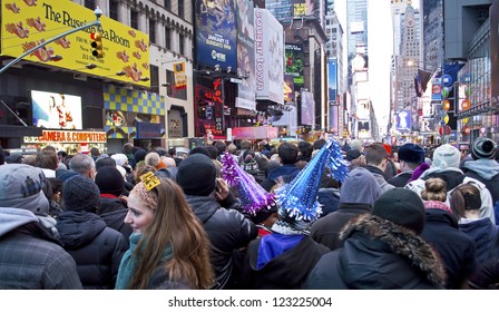 NEW YORK - DECEMBER 31: Crowds Gather In Times Square On New Years Eve, December 31, 2012 In New York City.