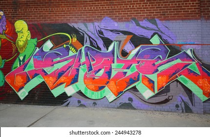 NEW YORK - DECEMBER 4, 2014: Graffiti art at East Williamsburg in Brooklyn. Outdoor art gallery known as the Bushwick Collective has most diverse collection of street art in Brooklyn 