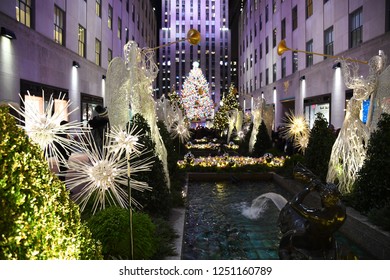 NEW YORK - DECEMBER 4, 2018: Famous Christmas Decoration With Angels And Christmas Tree - Rockefeller Centr On December 4, At New York City, NY.