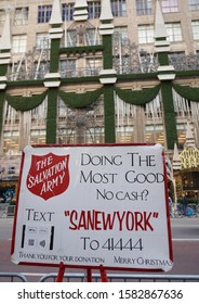 NEW YORK - DECEMBER 5, 2019: Salvation Army Sign And Red Kettle For Collections In Midtown Manhattan. This Christian Organization Is Known For Its Charity Work, Operating In 126 Countries