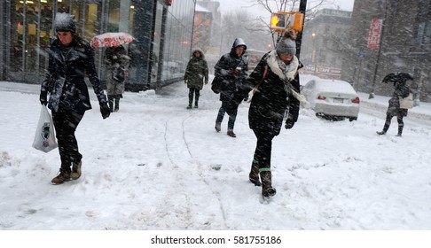 NEW YORK - FEB 9: Pedestrians Walk Along Astor Place On February 9, 2017 In New York. Approximately Six Inches Of Snow Fell In And Around NYC.