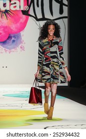 NEW YORK - FEBRUARY 12: A model Winnie Harlow walks the runway at the Desigual Fall/Winter 2015 collection during Mercedes-Benz Fashion Week in New York on February 12, 2015.