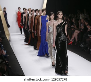 NEW YORK - FEBRUARY 13: Models walk runway during Fall/Winter 2013 presentation for J. Mendel collection at Mercedes-Benz Fashion Week at Lincoln Center on February 13, 2013 in New York
