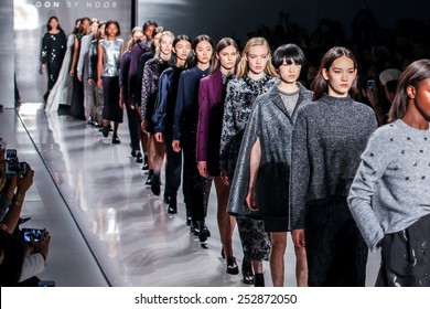 NEW YORK - FEBRUARY 14: A model walks the runway at the Noon by Noor Fall/Winter 2015 collection during Mercedes-Benz Fashion Week in New York on February 14, 2015.