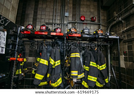 New york firefighters work tool and clothing in the fire station