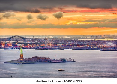 New York Harbor, New York, USA with the statue of liberty and Bayonne, New Jersey in the background. - Powered by Shutterstock