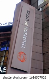 NEW YORK - JANUARY 13, 2020: THOMSON REUTERS brand logo sign at TIMES SQUARE location exterior