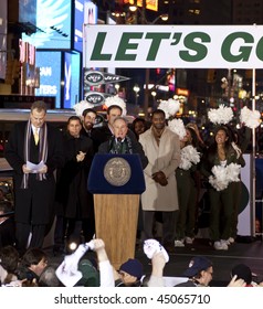 NEW YORK - JANUARY 21: (L-R) Michael Kay Mike, Tannenbaum, Leon Washington, And Curtis Martin At The New York Jets AFC Championship Game Pep Rally In Times Square On January 21, 2010 In New York City.