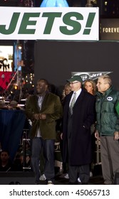 NEW YORK - JANUARY 21: (L-R) Leon Washington, Woody Johnson And David Herman At The New York Jets AFC Championship Game Pep Rally In Times Square On January 21, 2010 In New York City.