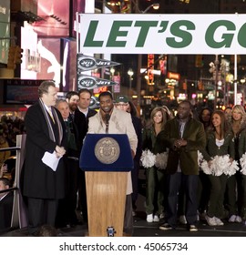 NEW YORK - JANUARY 21: (L-R) Michael Kay Mike, Tannenbaum, Leon Washington, And Curtis Martin At The New York Jets AFC Championship Game Pep Rally In Times Square On January 21, 2010 In New York City.