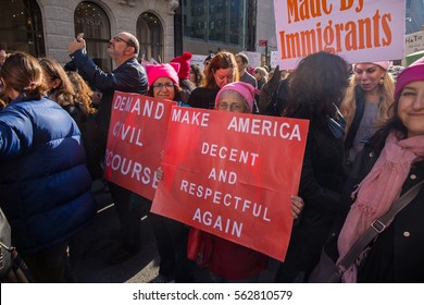 NEW YORK - JANUARY 21: Two Unidentified Women Holds A Signs About Civil Discourse, Decency, And Respect At The Women's March On New York City On January 21, 2017 In New York.