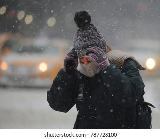 NEW YORK, NEW YORK- JANUARY 4, 2018:  People Bundle Up Against The Cold In The Soho Section Of Manhattan, As A Winter Storm Called A Bomb Cyclone,  Hits The City. 