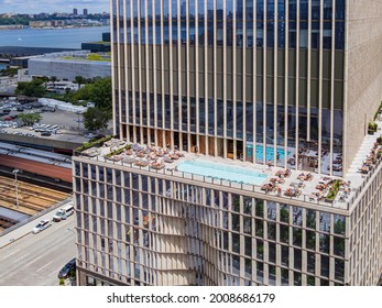 New York, JUL 4, 2021 - Sunny View Of The Equinox Hotel New York With Swimming Pool