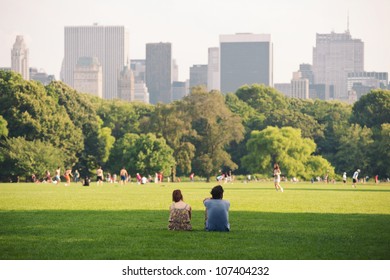 NEW YORK - JULY 1: People enjoying relaxing outdoors in Central Park on July 1, 2012 in New York. The park is the most visited urban park in the United States with 35 million visitors annually.