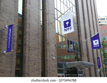 NEW YORK - JULY 11, 2017: NYU flag on David B. Kriser Dental Center in Lower Manhattan. NYU College of Dentistry is the third oldest continuously operating and the largest dental school in the USA